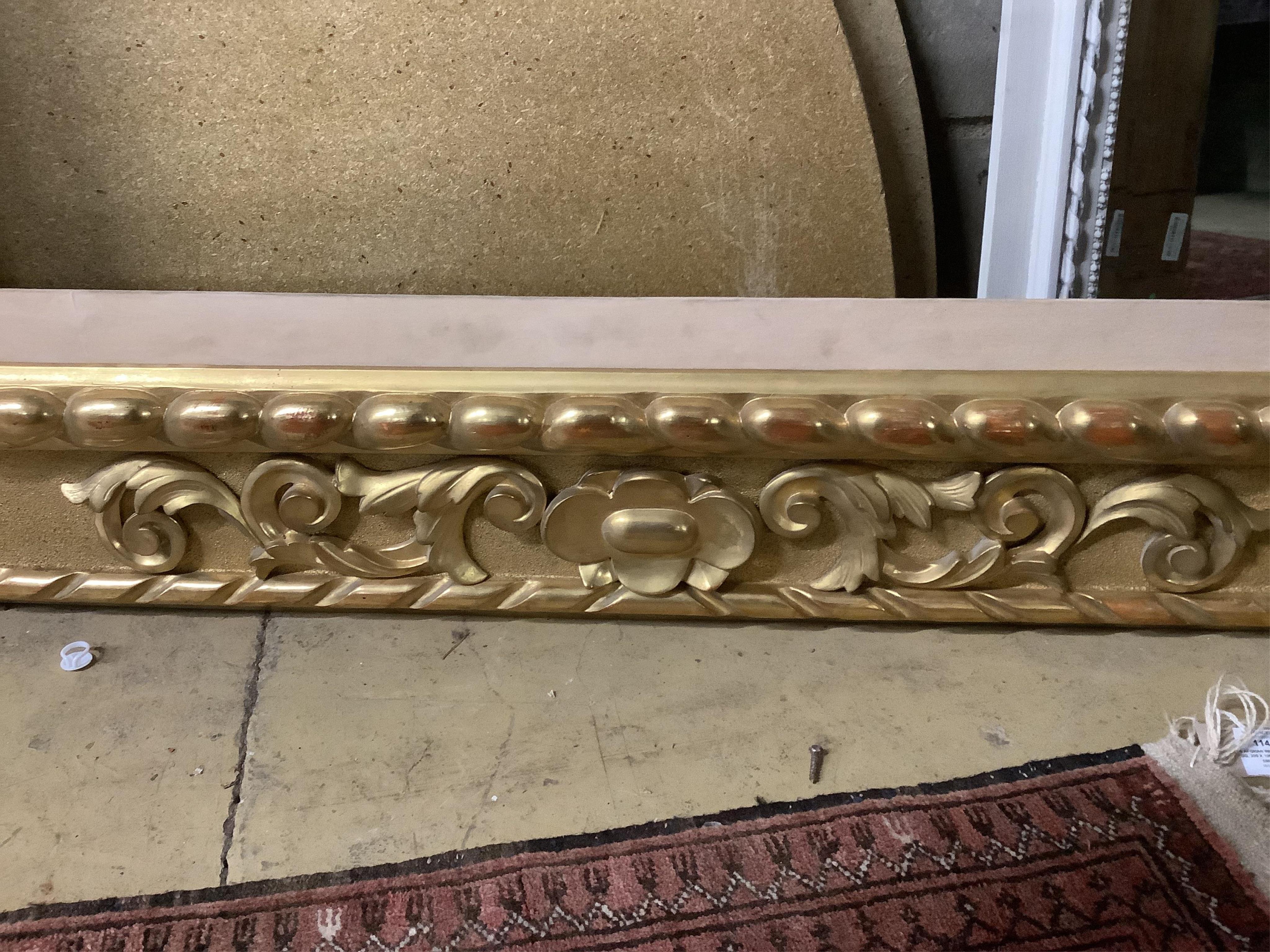 A rectangular giltwood and composition frame, width 142cm, height 180cm. Condition - good